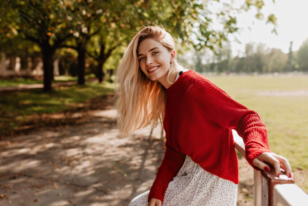 sculptra vs profhilo - a happy woman looking beautiful