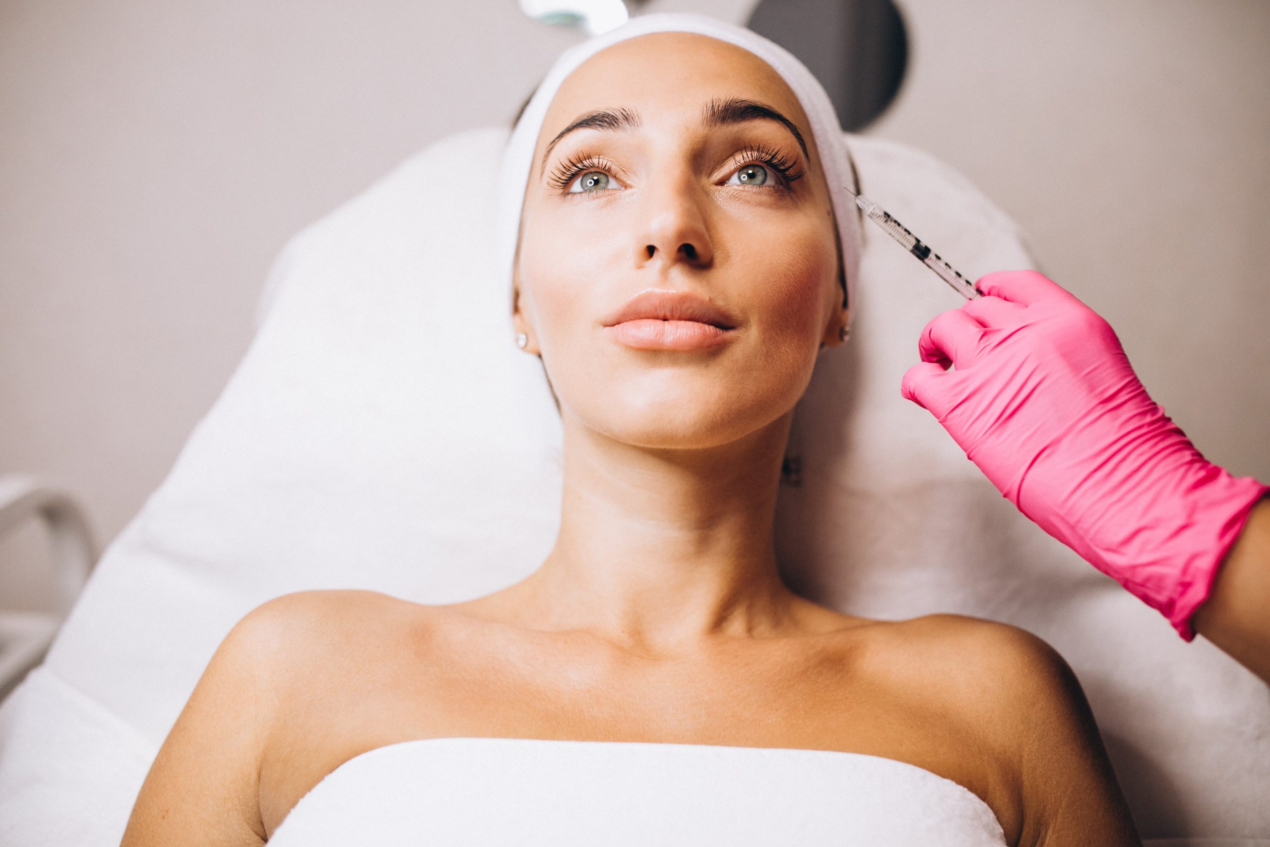 female patient ready for Radiesse filler treatment