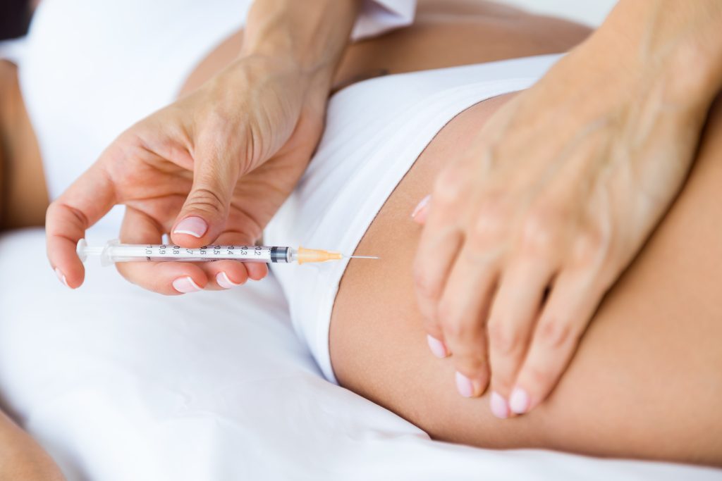 female patient receiving hip dip filler