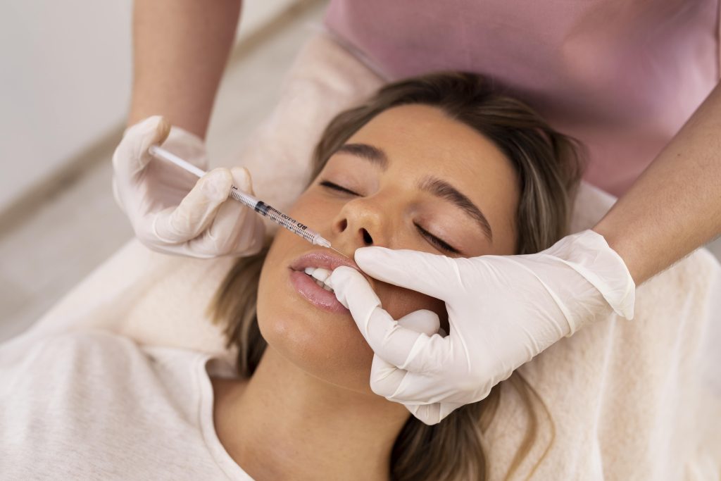 female patient receiving juvederm lip filler